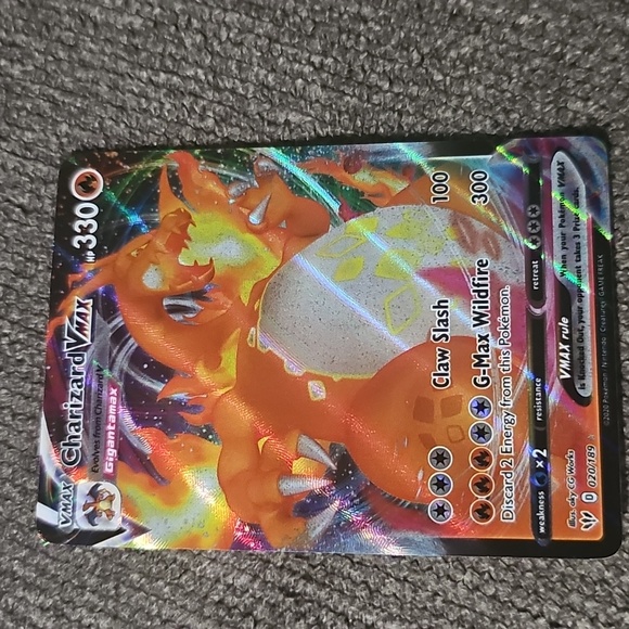 Pokemon Charizard VMAX Card - Vibrant Orange and Yellow Games